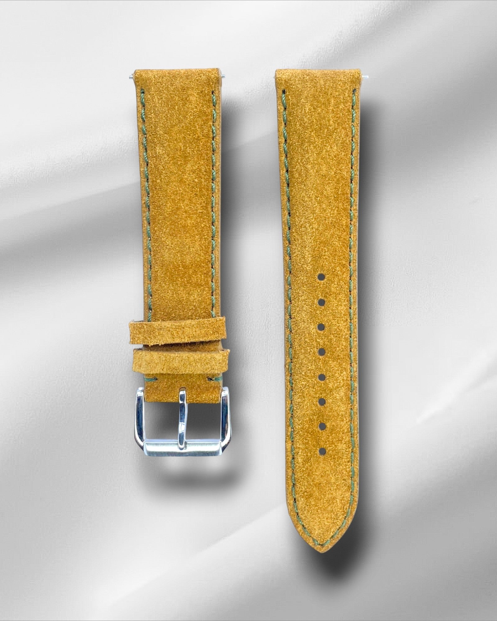Tan suede strap with green stitching
