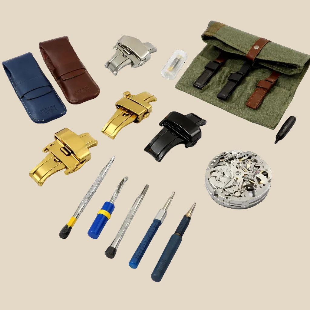 Collection of watch parts and tools on a white background