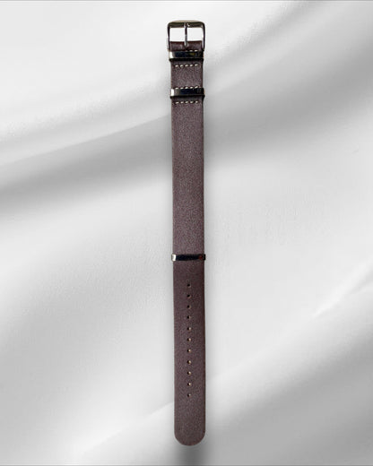 Brown watch strap with silver buckle on a white background